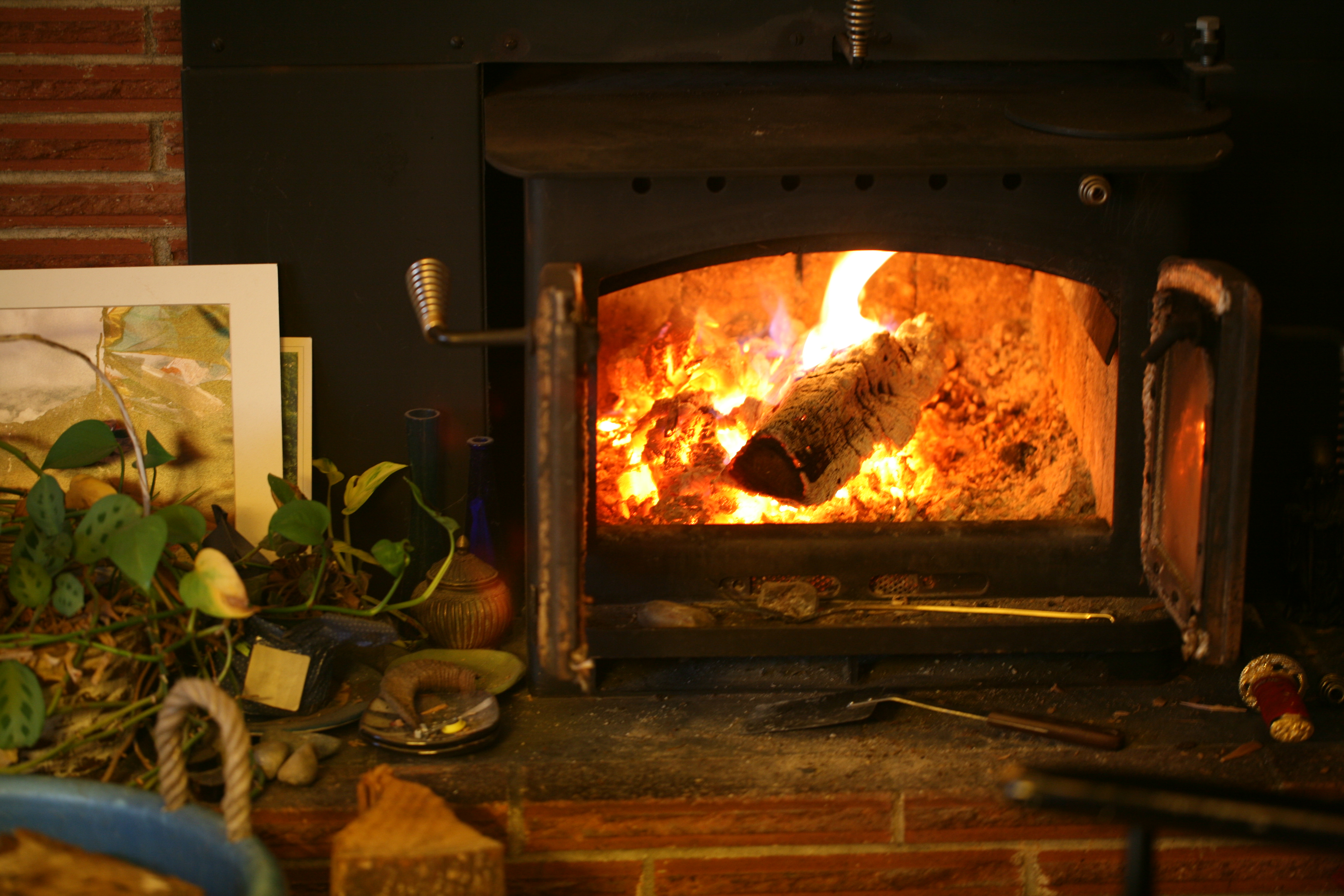 Fireplace ablaze by Gordon Lee